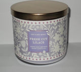 Bath & Body Works White Barn vela de tres mechas emite luz cálida y fragancia
