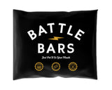 Battle Bars muestra cinco sabores en un paquete, snack rápido y proteico.