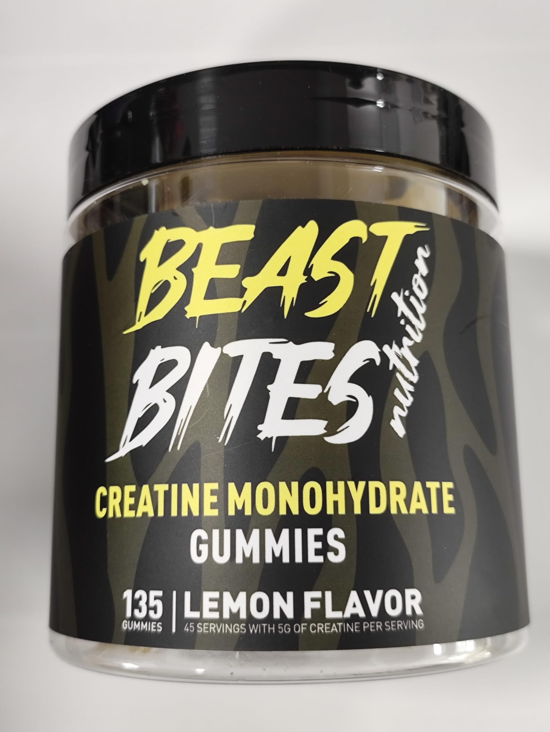 Gomitas de creatina BEAST BITES Nutrition en frasco, sabor limón para uso diario.