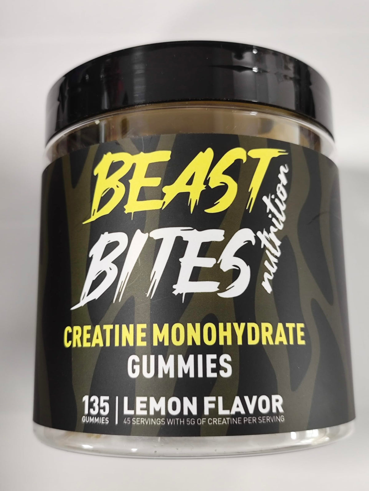 Gomitas de creatina BEAST BITES Nutrition en frasco, sabor limón para uso diario.