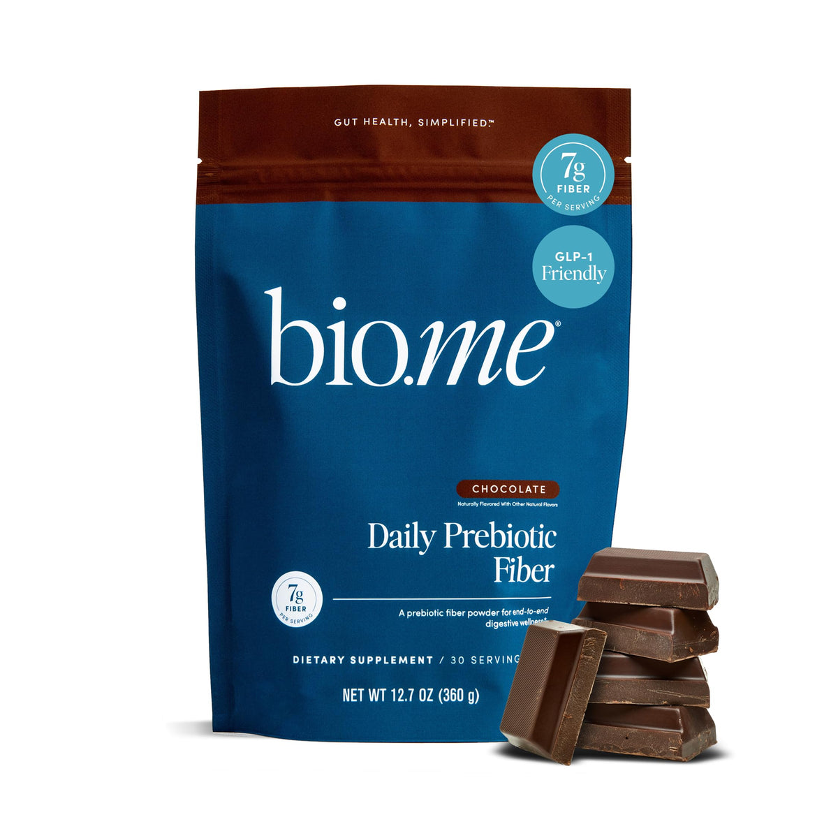 Bio.me polvo prebiótico diario fibra chocolate en envase, apoyo digestivo suave.