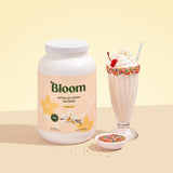 Bloom Nutrition proteína aislada de suero vainilla, cucharilla de porción para proteína de rápida absorción.