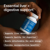 BodyBio TUDCA mano sosteniendo frasco: diseño compacto para uso diario.