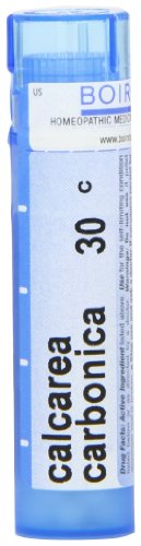 Boiron Calcarea Carbonica bolitas, primer plano mostrando la textura suave