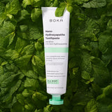 Pasta dental Boka nano hidroxiapatita naranja crema envase, sabor cremoso para cepillado diario.