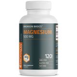 Bronson Magnesio 500 mg, manos sosteniendo tabletas en casa