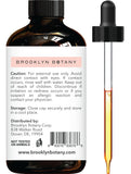 Frasco de vidrio ambar protege la pureza del aceite de toronja Brooklyn Botany.