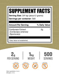 Cordyceps polvo de BulkSupplements mezclado en plato, realza sabor y bienestar.