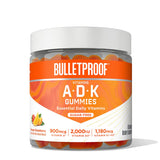 Bulletproof gomitas sin azúcar en frasco; sabor naranja y fresa, snack saludable.