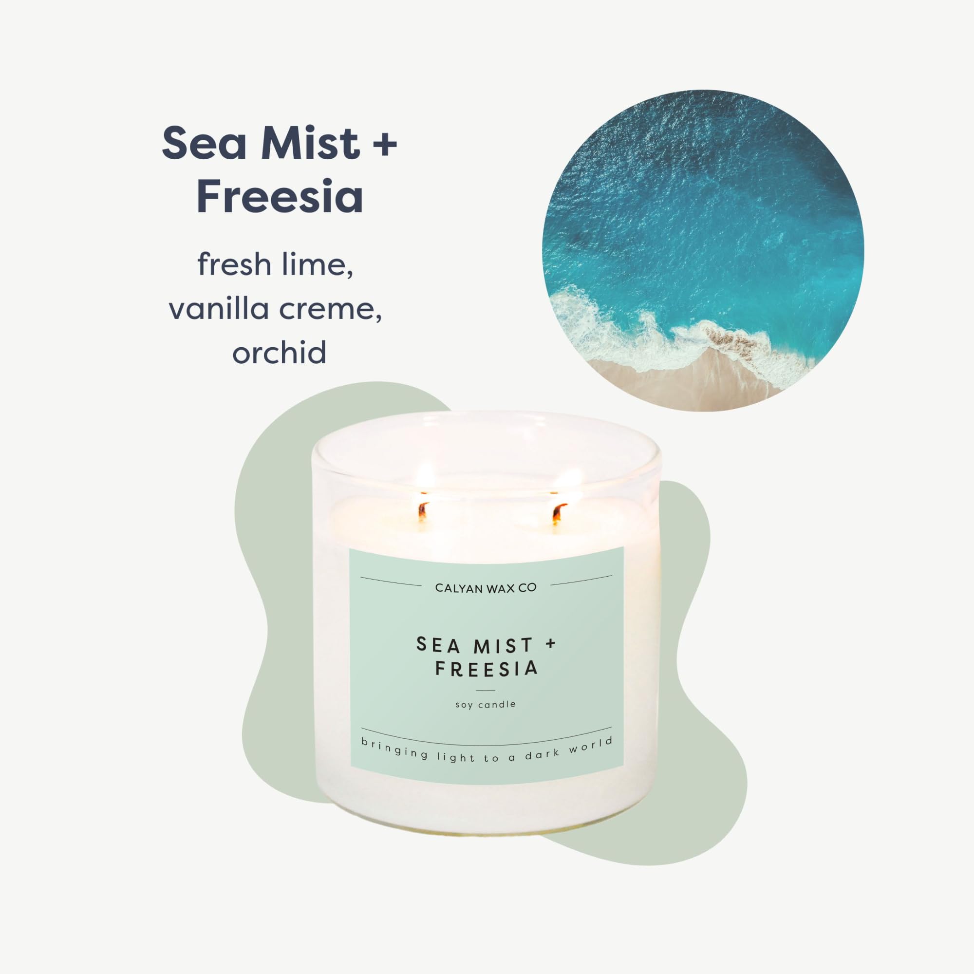 Vela Calyan Wax Co Sea Mist Fresia, dos mechas, aroma suave para dormitorio.