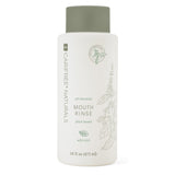 CariFree Naturals Enjuague Bucal sin alcohol en frasco para uso diario.