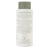CariFree Naturals Etiqueta con magnolia y elementos naturales visibles.