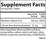 Carlson B-2 Riboflavina: tableta en mano lista para tomar.