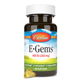Capsulas blandas de Carlson E-Gems sobre la mesa, listas para uso diario.