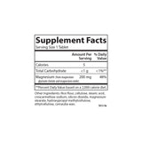 Carlson magnesio chelatado 200 mg, tabletas en mano: formato práctico para la rutina diaria.