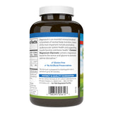 Carlson magnesio chelatado 200 mg, tabletas en vaso con agua: fácil consumo diario.