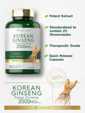Carlyle Ginseng Coreano 2000 mg, cápsulas en mano para uso diario.