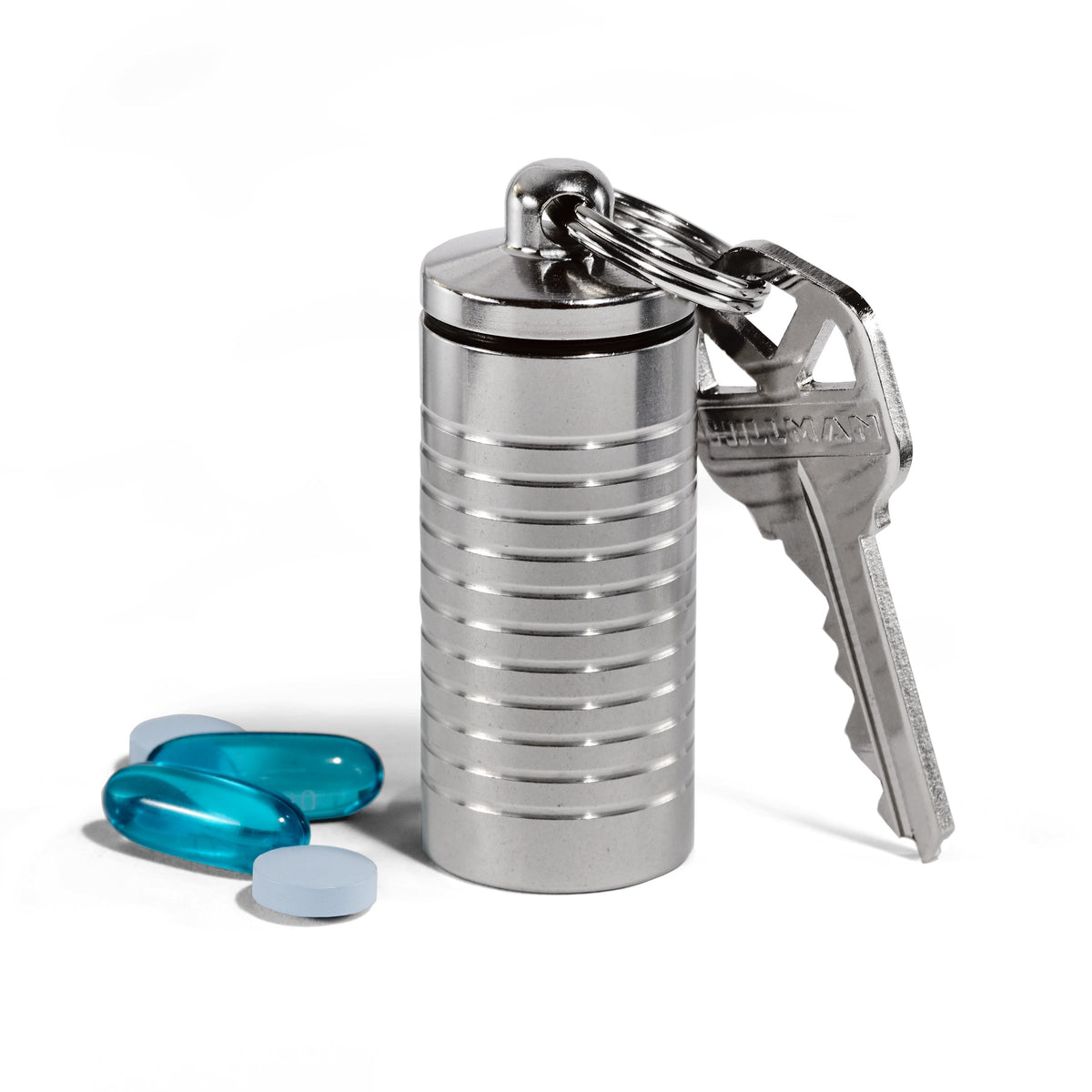 Cielo Pill Holders: llavero de acero inoxidable con cierre seguro para píldoras.