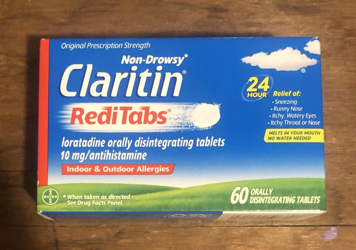 Claritin RediTabs botella de 60 cápsulas para alivio de alergias todo el día.