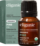 Cliganic Aceite Esencial de Pino en envase de vidrio para aromaterapia suave.