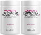Codeage multivitaminas diarias para mujeres, botella en mano, apoyo a la vitalidad diaria.