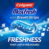 Colgate Max Fresh, uso diario en el baño con cepillo y pasta.