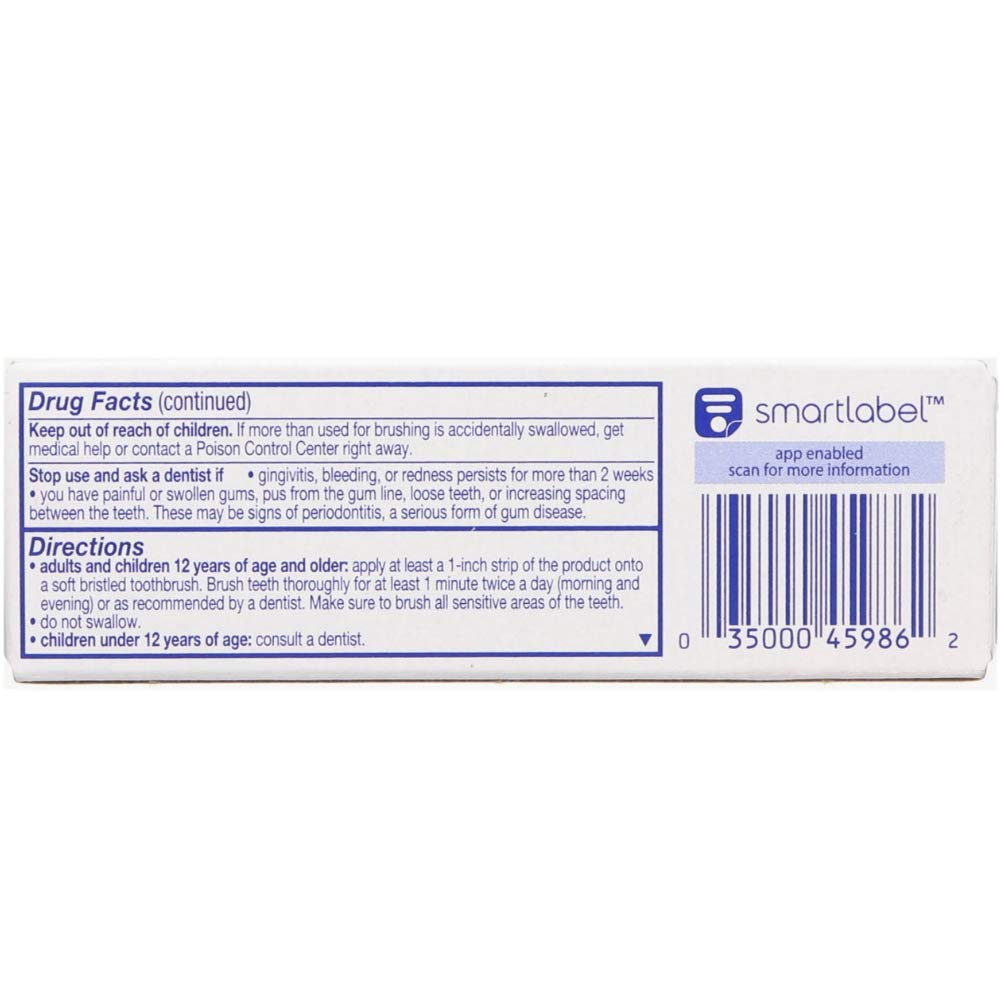 Colgate Total Clean Mint, tubo en uso, alivia la sensibilidad y deja aliento fresco.