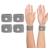 Pulsera COMFYTHERA anti náuseas en gris para alivio durante viajes.
