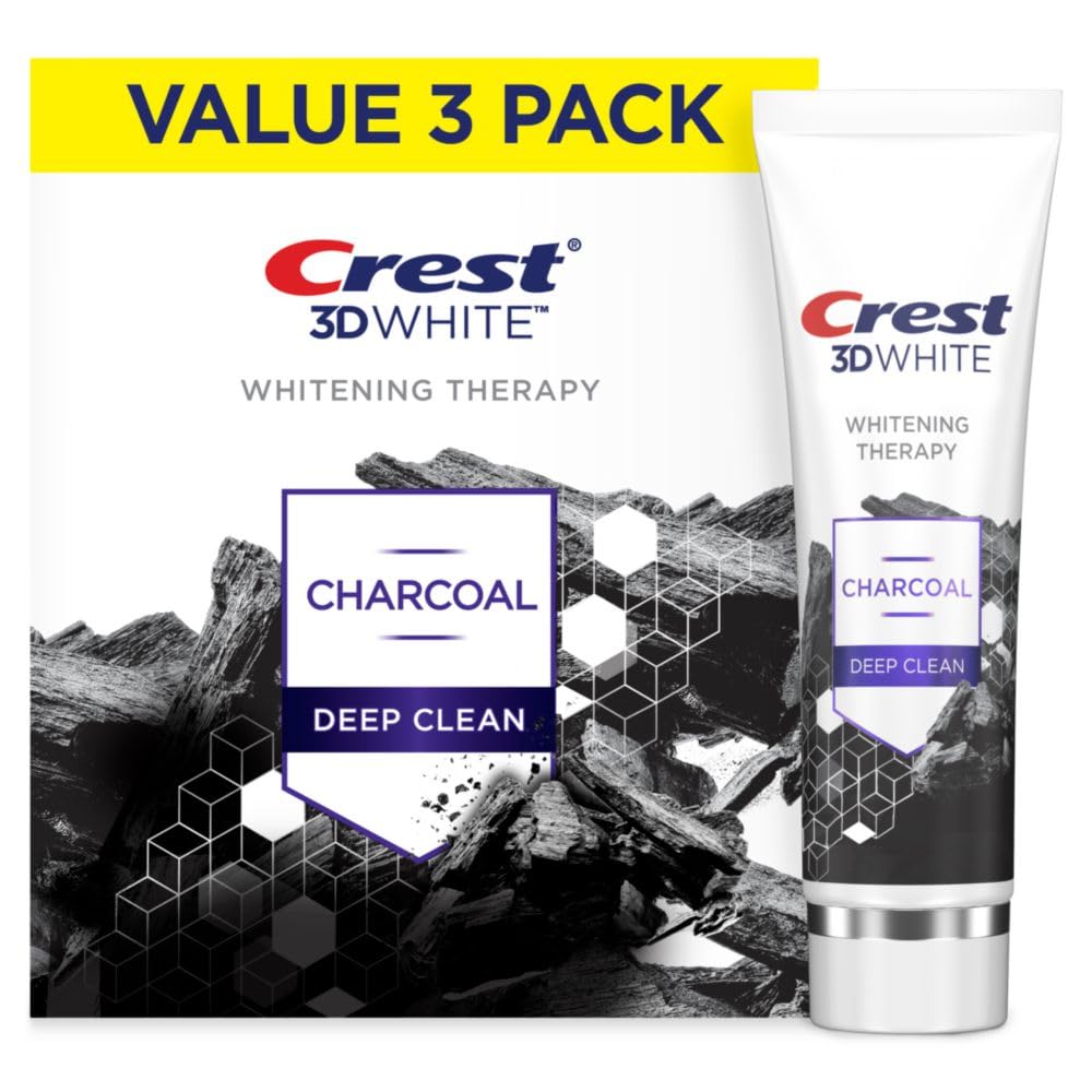 Crest 3D White Whitening Therapy con carbón activado, frente de tubo, combate manchas superficiales.