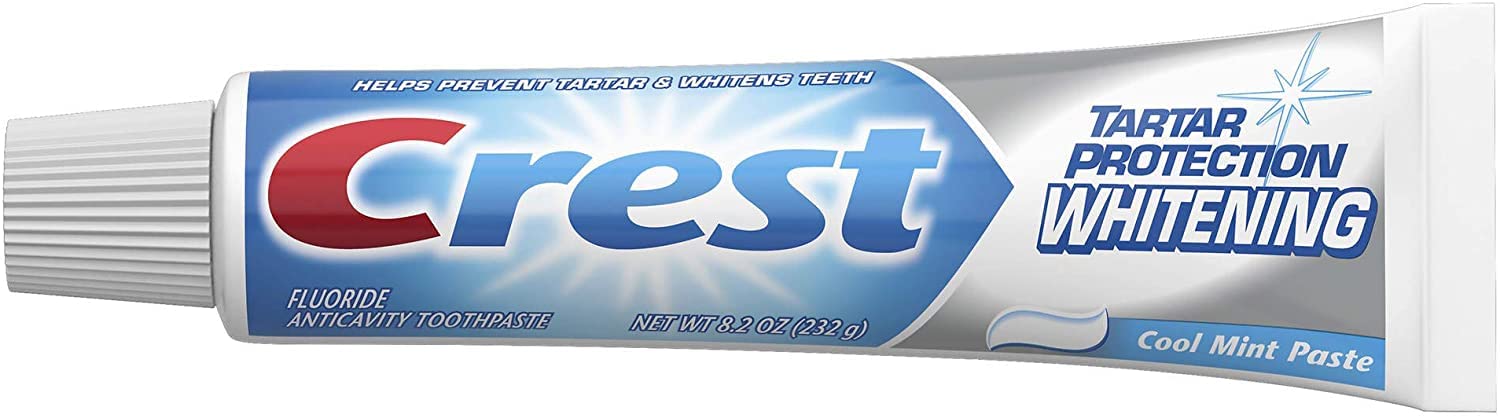 Etiqueta de Crest muestra ingredientes clave y fluoruro para cuidado diario.