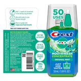 Crest Scope Concentrado botella compacta para llevar en la palma.