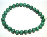 CRYSTALMIRACLE pulsera malaquita detalle, diseño artesanal para equilibrio emocional.