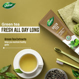 Dabur dentífrico té verde frente al empaque, experiencia de uso diario y frescura duradera.