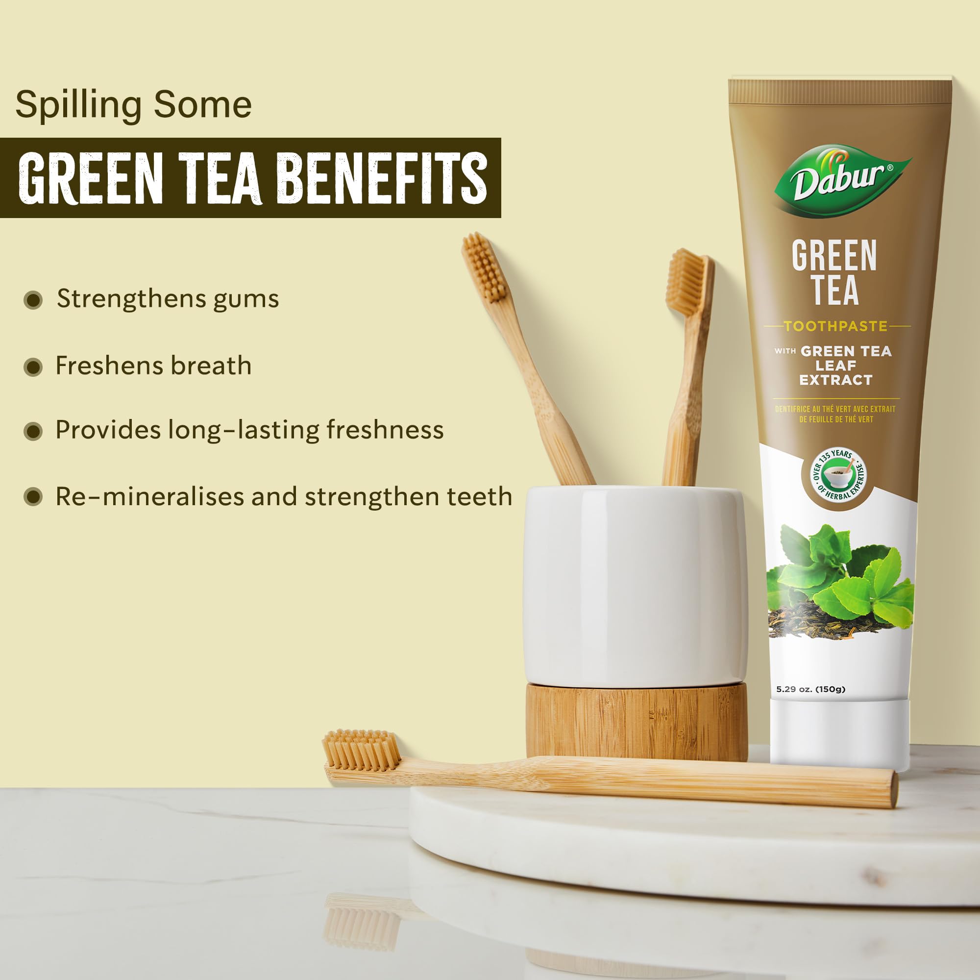 Dabur dentífrico té verde, ingredientes visibles, extracto de té verde para cuidado natural.