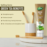 Dabur dentífrico té verde, ingredientes visibles, extracto de té verde para cuidado natural.