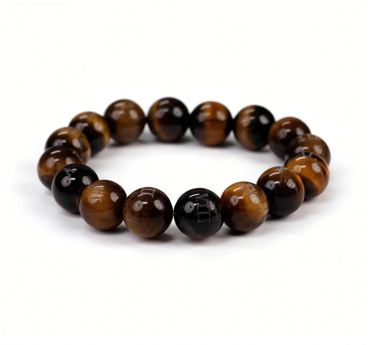 Pulsera Dare to Mystic con ojo de tigre y cuentas 12mm, ideal para enfoque diario.
