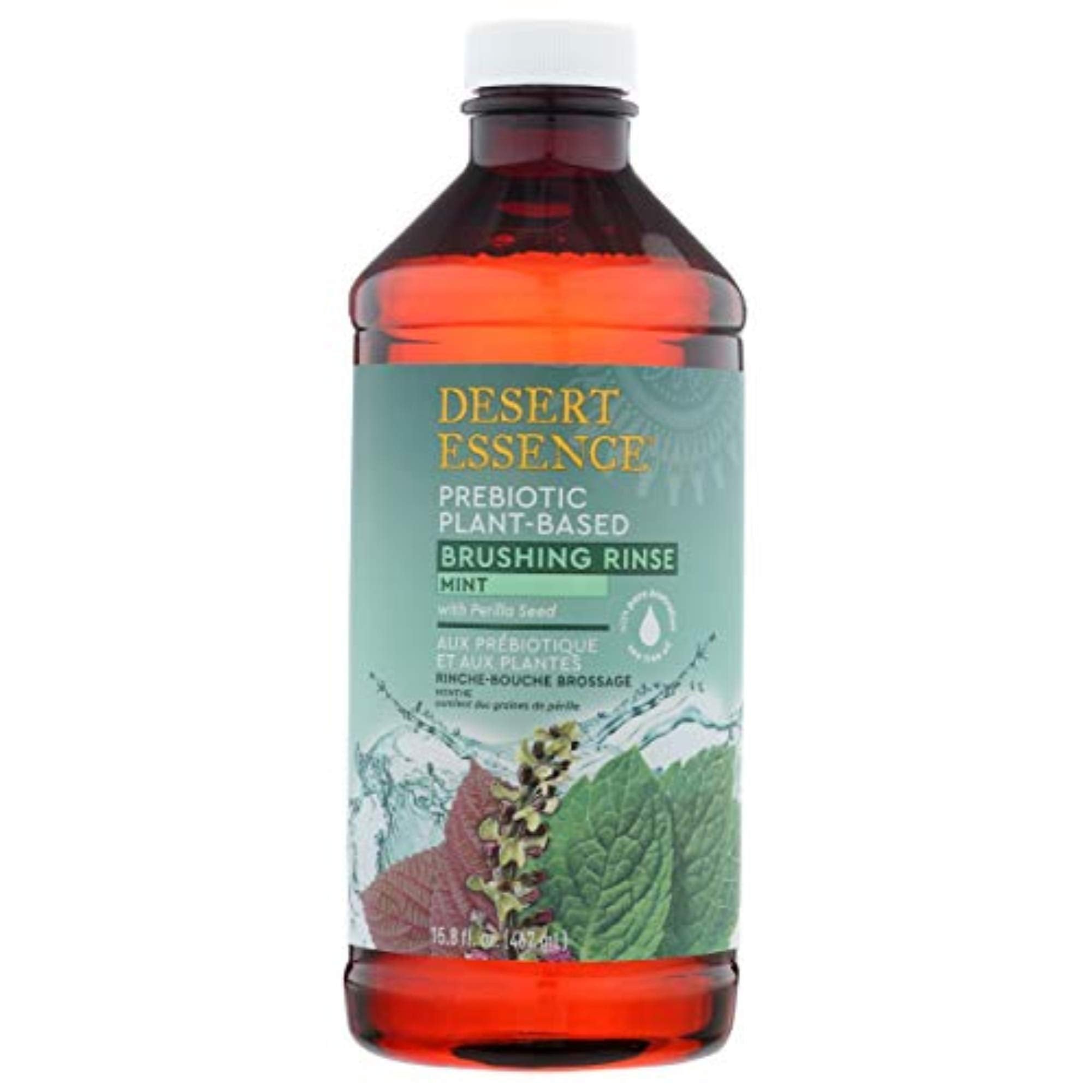 Desert Essence botella de enjuague bucal menta para aliento fresco y microbioma saludable.