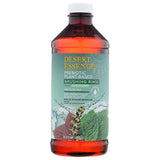 Desert Essence botella de enjuague bucal menta para aliento fresco y microbioma saludable.