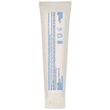 Desert Essence pasta dental sin fluoruro, etiqueta clara para familia.