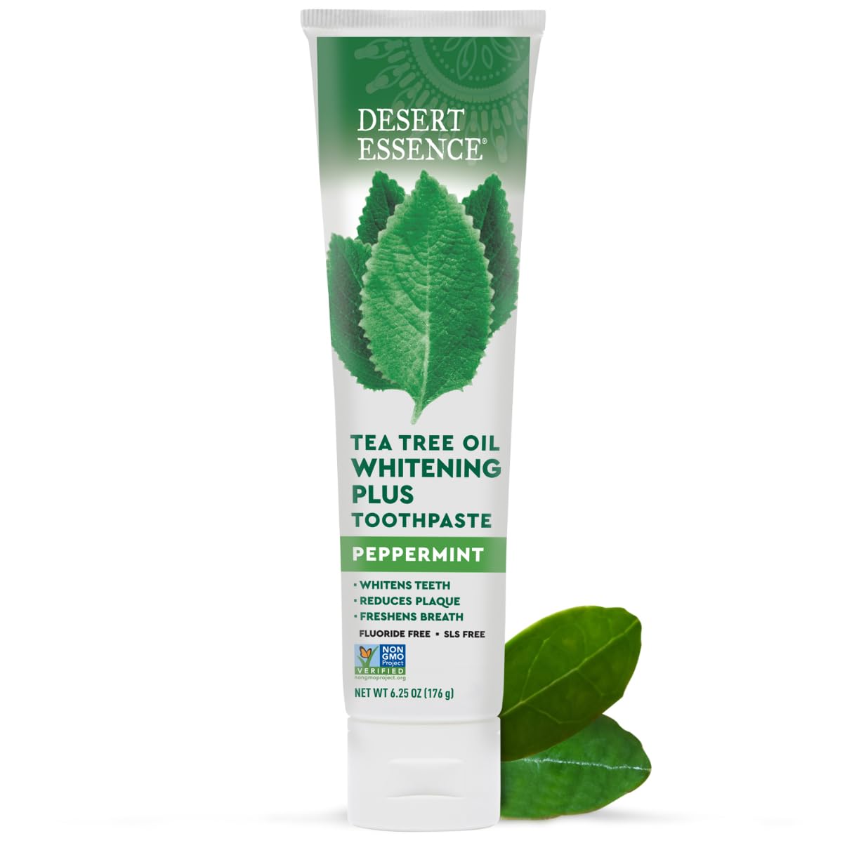Pasta Desert Essence con aceite de árbol de té en envase, cuidado natural para blanqueado suave.