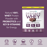 Designer Wellness Designer Whey con probióticos y fibra para digestión saludable.
