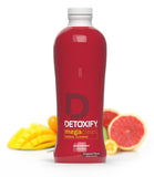 Detoxify Mega Clean botella tropical: sabor fresco de hierbas para empezar el día