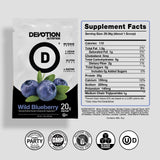 Devotion Nutrition Wild Blueberry, batido cremoso en vaso