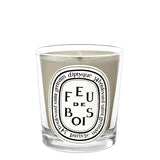 Diptyque Feu de Bois mini vela de 70 g para crear un ambiente cálido y reconfortante.