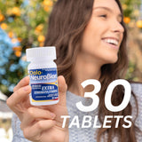 Persona tomando una tableta Dolo Neurobion para uso diario.