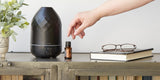 doTERRA Toronja, aceite esencial en frasco, aroma fresco para hogar.