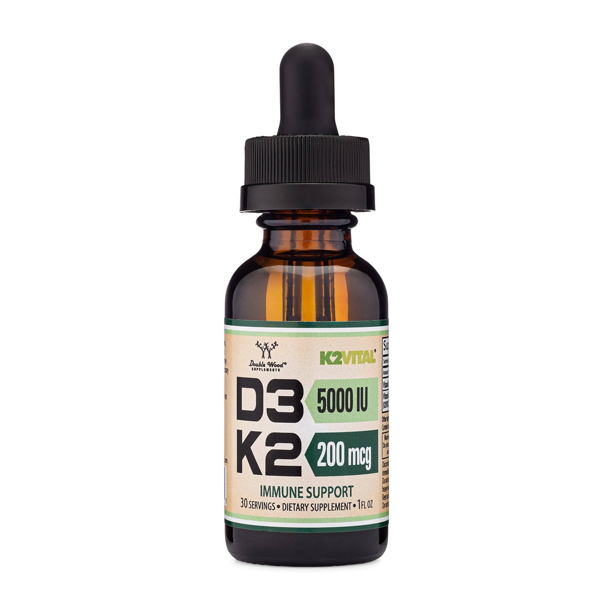 Double Wood Vitamin D3 K2 en gotas sobre botella, mejora absorción y balance de calcio.