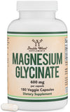 Double Wood Supplements magnesio glicinato 400 mg, botella visible, dosificación precisa para uso diario.