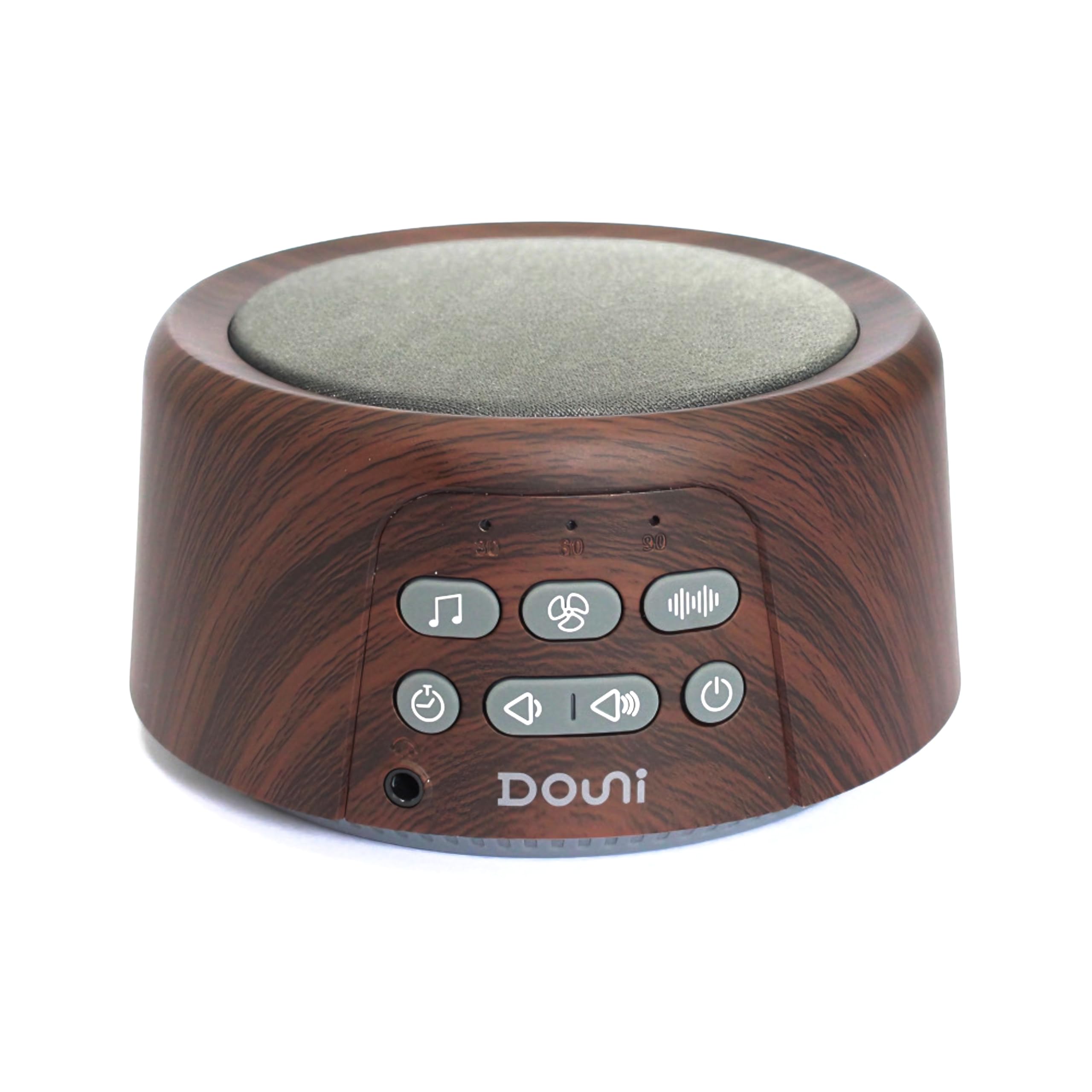 Douni máquina de ruido blanco con acabado madera marrón sobre mesita.