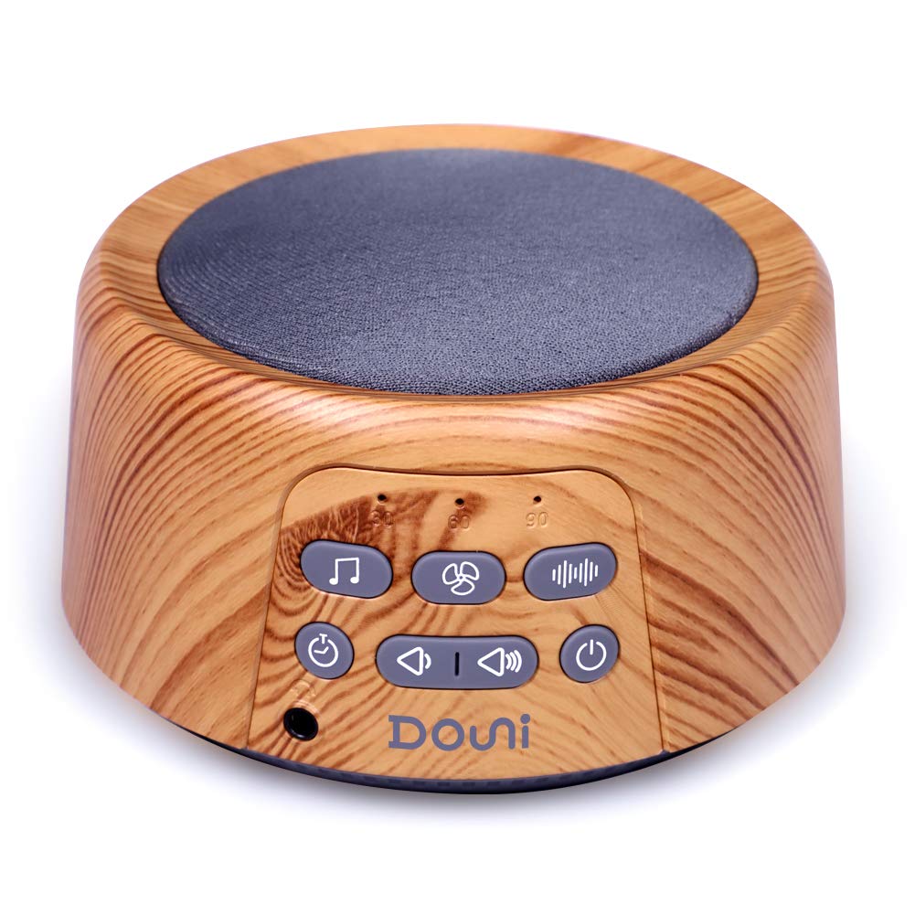 Douni máquina de sonidos sueño con acabado grano madera, ideal para dormitorio.